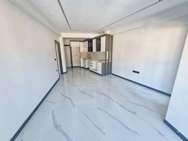 Zeytinli'de Satılık 1+1 ve Daire Balkonlu Yerden Isıtmalı