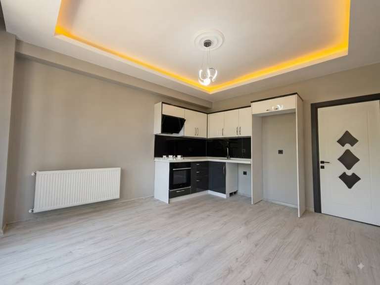 Tuzcumurat'ta Satılık 1+1 ve Daire Merkezi Konumlu Doğalgazlı